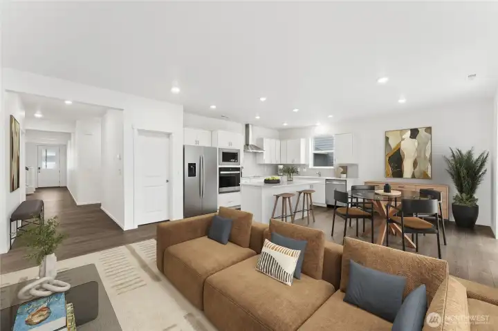 Great room design open to the kitchen and eating area.  Picture for representational purposes only, colors and features may vary.