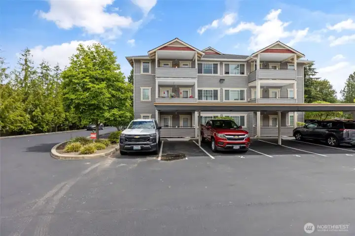 This building has ample close visitor parking if you need more than the covered assigned parking spot and/or 2 car garage This building has ample close visitor parking if you need more than the covered assigned parking spot and/or 2 car garage
