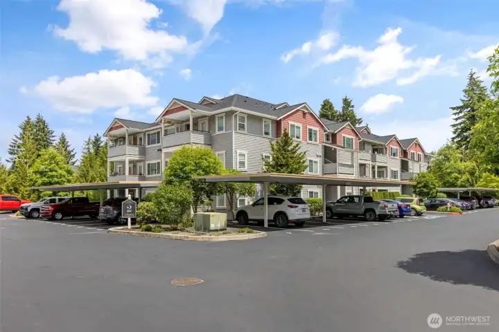 This building has ample close visitor parking if you need more than the covered assigned parking spot and/or 2 car garage This building has ample close visitor parking if you need more than the covered assigned parking spot and/or 2 car garage