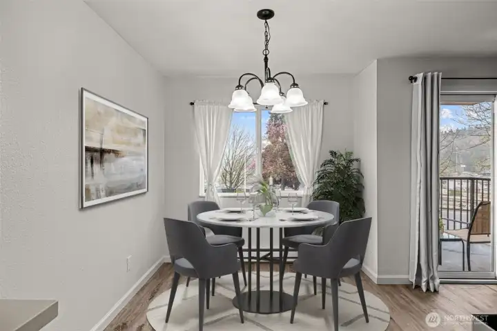 Virtually staged dining room. Virtually staged dining room.