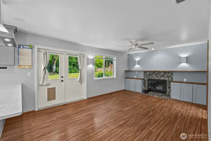 Family room off kitchen with wood burning fireplace