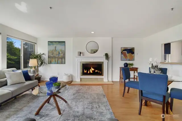 The living room has a wood fireplace.