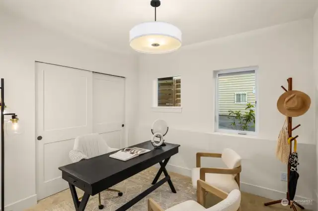 On the entry level resides an additional bedroom - convert to a home office set up, fitness space, or reading room. The possibilities are endless!