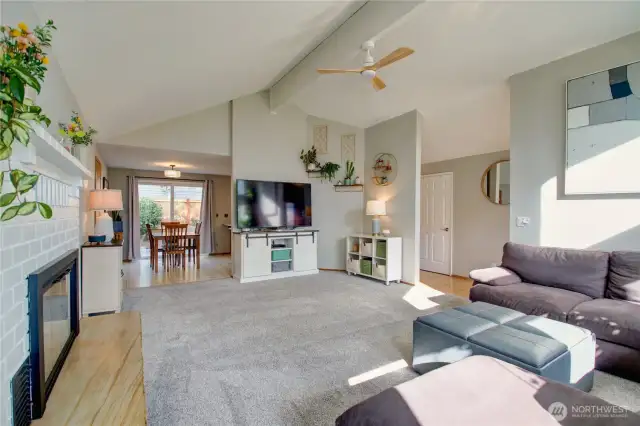 Vaulted ceiling in living room and dining area