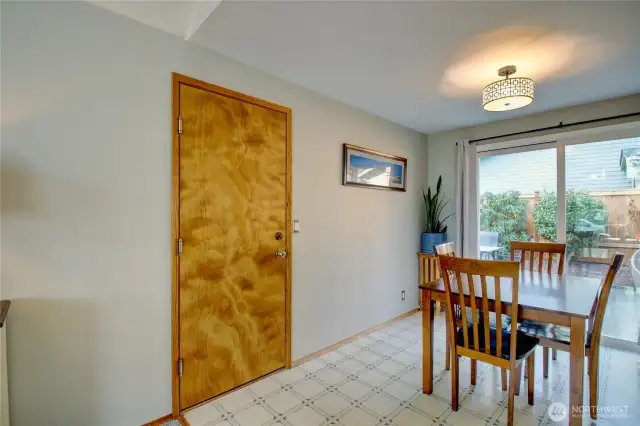 Dining area.  Slider door to patio.  Man door to garage.