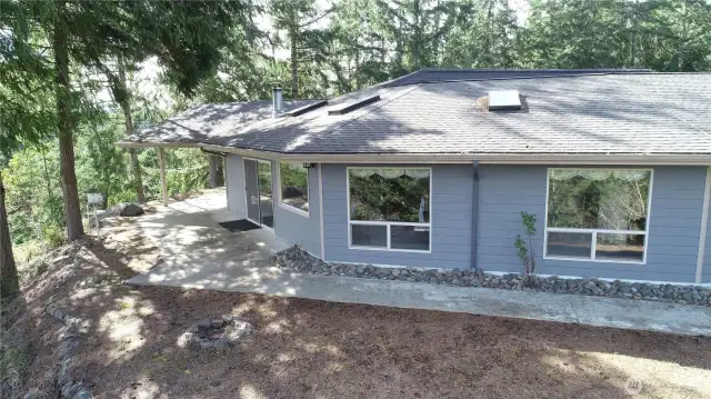 Aerial view of the house and covered deck.
