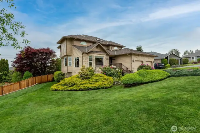 Perfectly maintained, private/mature landscaping.