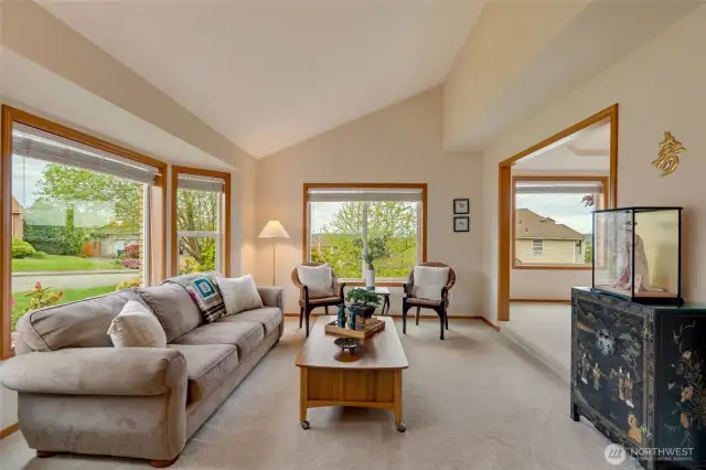 Upon entry immediately greeted by comfortable living room...