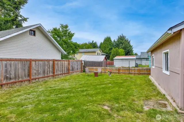 Large backyard for entertaining or possible expansion.