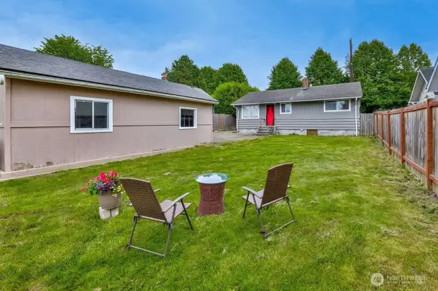 Large backyard for entertaining or possible expansion.