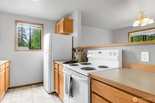Kitchen! This is an end unit with the bonus of a kitchen window! Open to dining room.