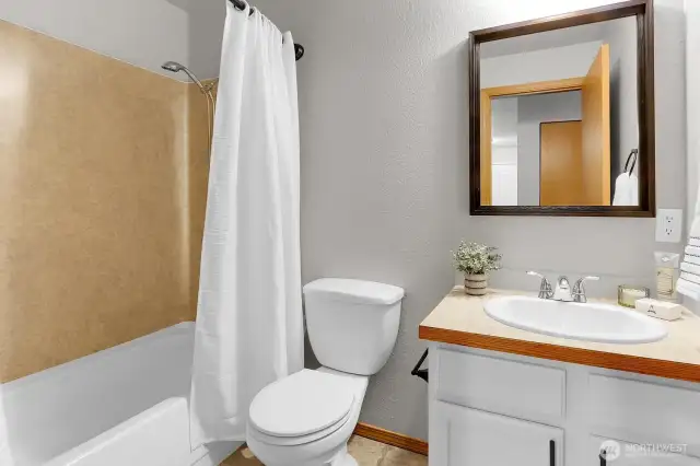 Hall bathroom, with nice sized tub.