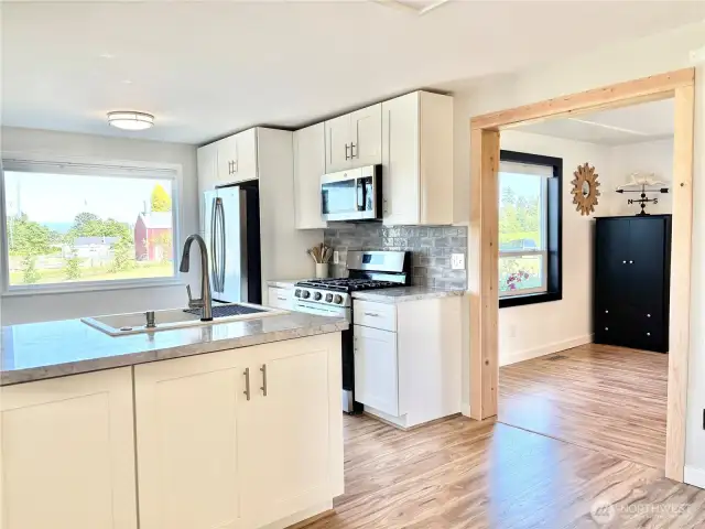 Kitchen leading into living room.