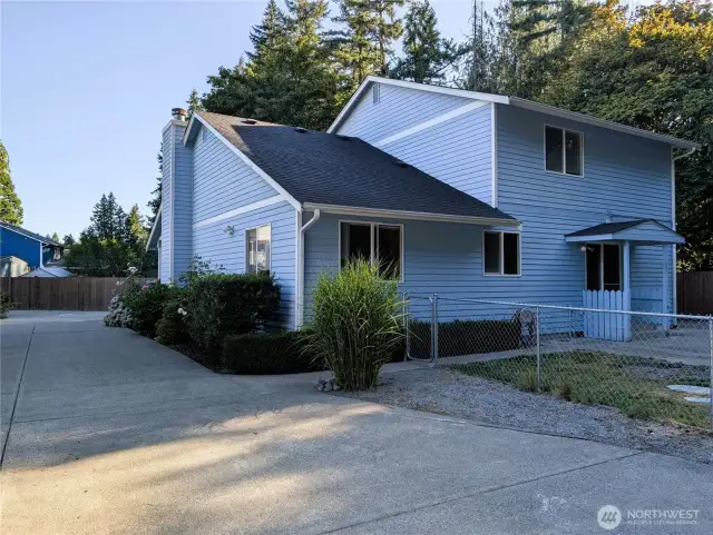 Say Yes to this address. Welcome to #7120 242nd St E, Graham, WA 98338. Gated entry. 3 bedrooms, 2.5 bathrooms & 7 covered parking spaces. .295 acre private location. No HOA!. Private setting backs up to greenbelt