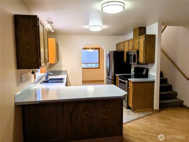Say Yes to this address. Kitchen with stainless steel appliances. Welcome to #7120 242nd St E, Graham, WA 98338.