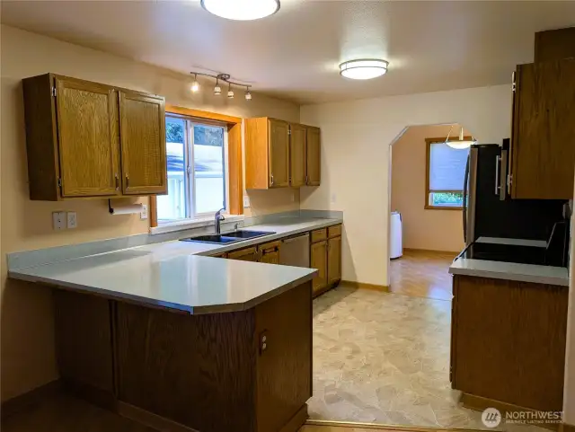 Say Yes to this address. Kitchen with stainless steel appliances. Welcome to #7120 242nd St E, Graham, WA 98338.