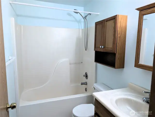 Main bathroom upstairs. Say Yes to this address.  #7120 242nd St E, Graham, WA 98338.