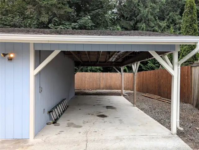Lots of parking. 5 car detached covered parking plus 2 car attached garage. Say Yes to this address. #7120 242nd St E, Graham, WA 98338.