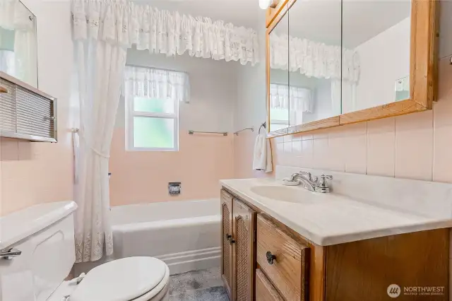 3/4 Bath off Hallway with hardwood flooring
