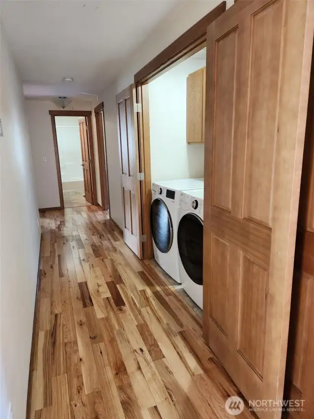 Hallway has a laundry closet