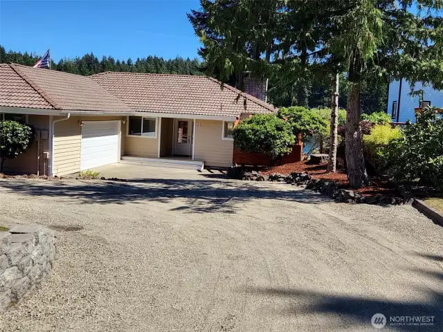 Circular driveway and a 2 car garage