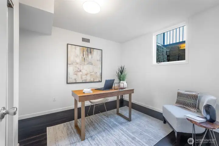 4th bedroom downstairs is spacious enough to be another bedroom or turn info an office