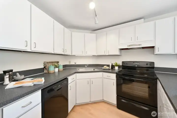 Ample kitchen space with abundant storage and views of Lake Washington while you cook.