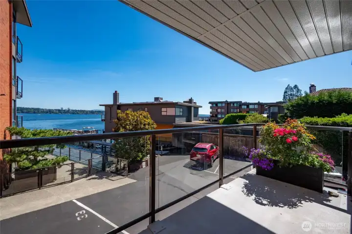 Enjoy morning coffee and evening relaxation from your spacious private balcony overlooking Lake Washington and downtown Bellevue.