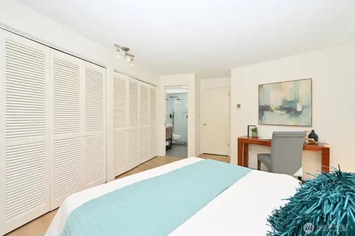 Wall to wall closets provide exceptional storage with the convenience of an attached primary bathroom.