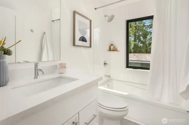 Full bathroom upstairs with heated floors