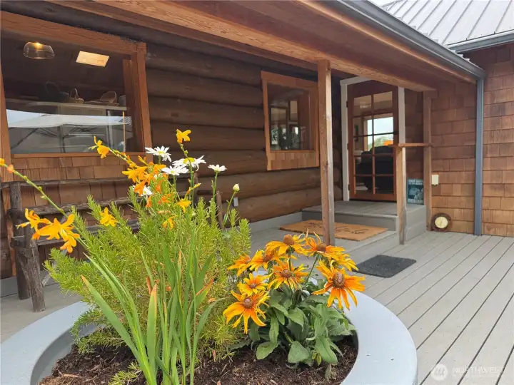 Access covered porch and deck/patio area from the living space inside.
