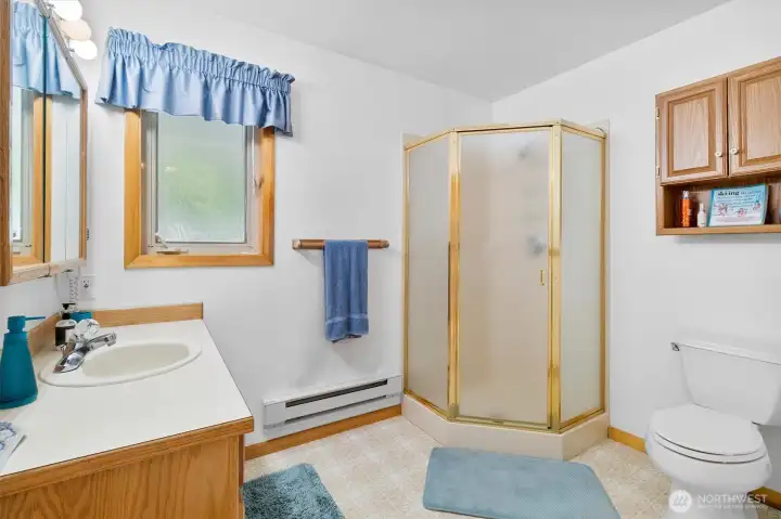 Clean ¾ bathroom with updated fixtures and shower.