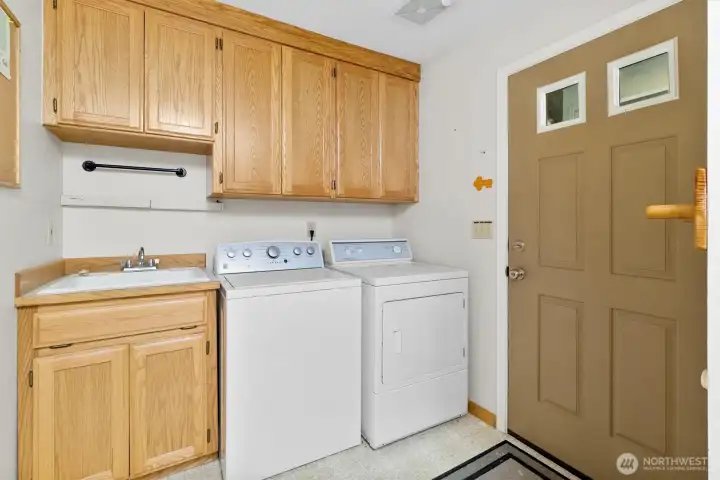 Laundry/mudroom with cabinet storage—perfect for mountain living.