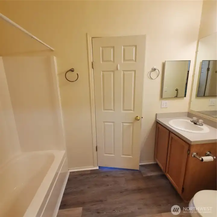 2main bathroom with tub and shower.