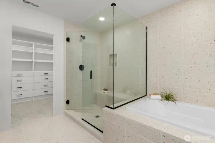 Primary bathroom and walk in closet.