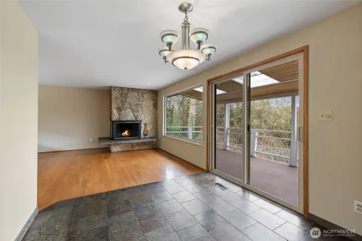 This view is from the dining room looking into the living room. The slider to the right gives access to the huge covered deck.