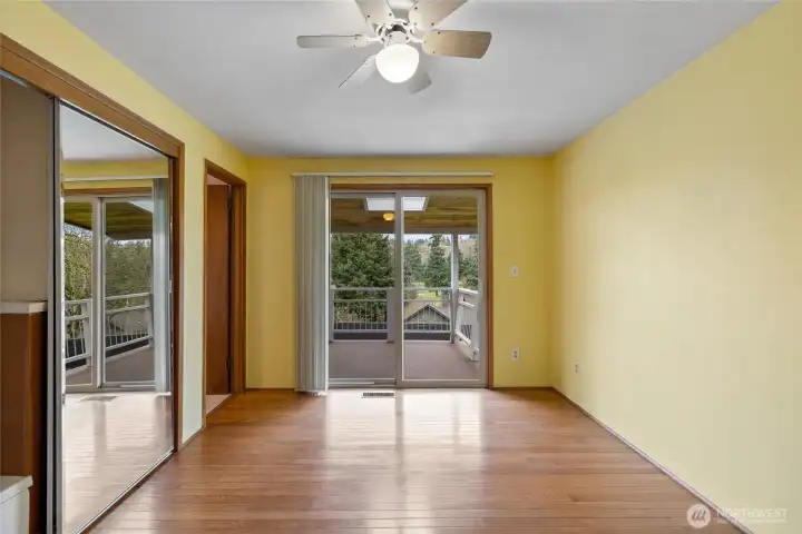 Primary bedroom has 3/4 bath , and a slider onto the very cool deck.