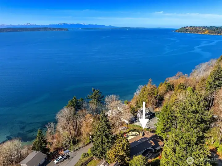 Welcome to this stunning, two-story home perched privately above the Puget Sound in the heart of Seahurst with incredible views from almost every room in the home.