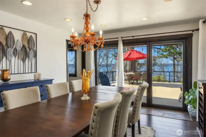 While you dine, you can enjoy amazing views out the large floor to ceiling glass doors that step out to the balcony deck.
