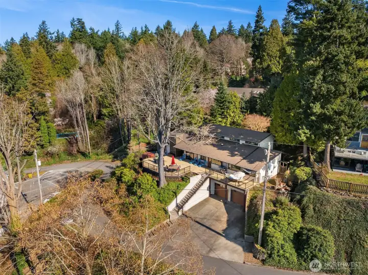 Two car attached garage with ample driveway parking.