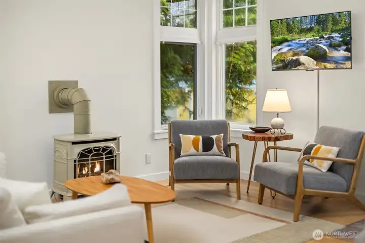 Oversized corner windows fill the space with natural daylight.