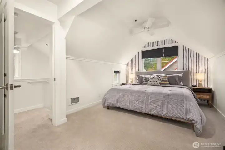 Vaulted ceilings enhance the upper level with a sense of space and light.