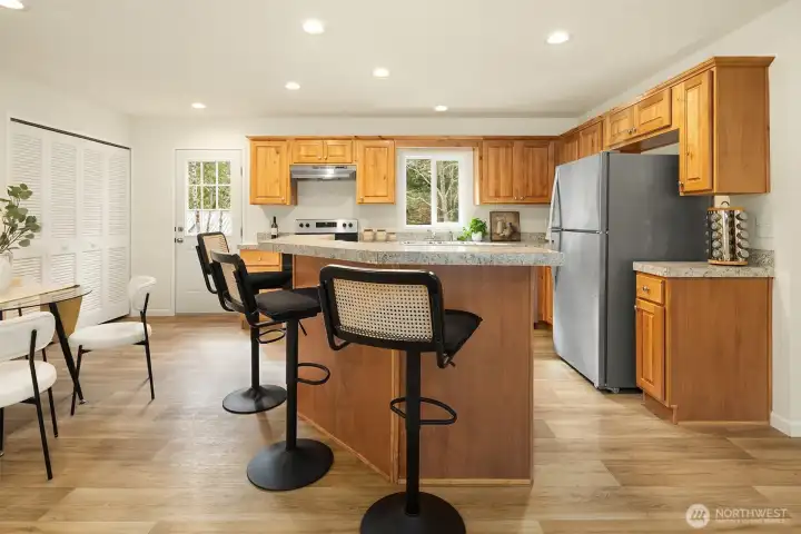 Spacious kitchen with island seating and modern finishes