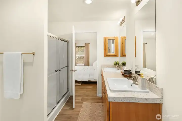 Well-appointed bathroom with separate shower and modern finishes
