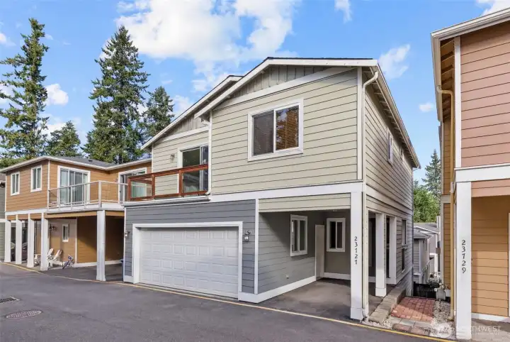 Tucked away in a serene setting. Two car garage plus a carport.