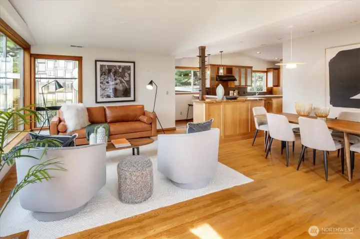 The open-concept design connects the formal dining room to the living room.