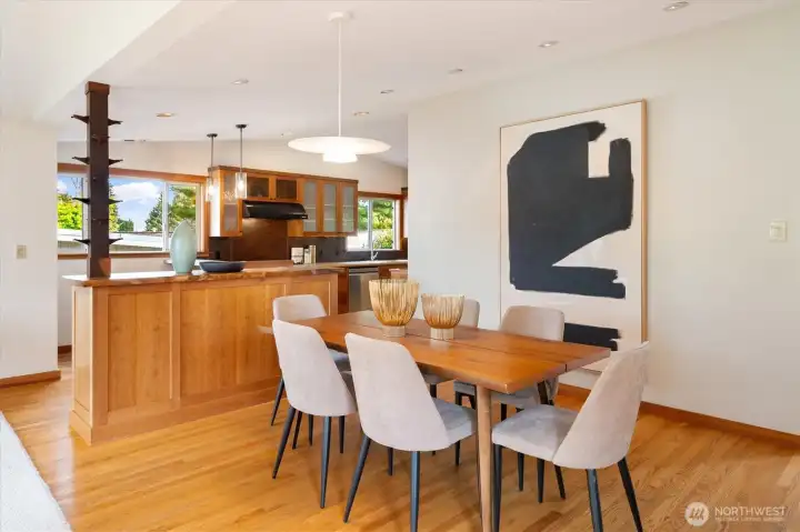 The dining room has enough space for a few or many.