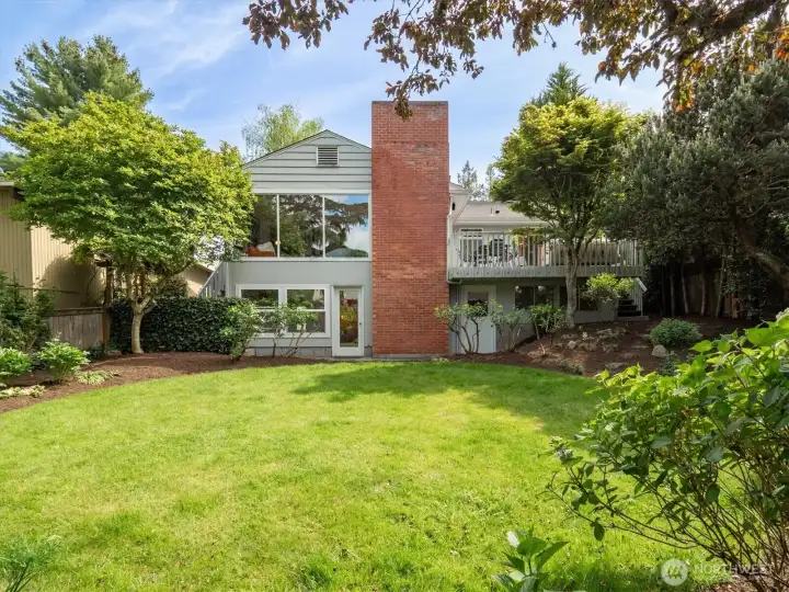 A level fully fenced private backyard.