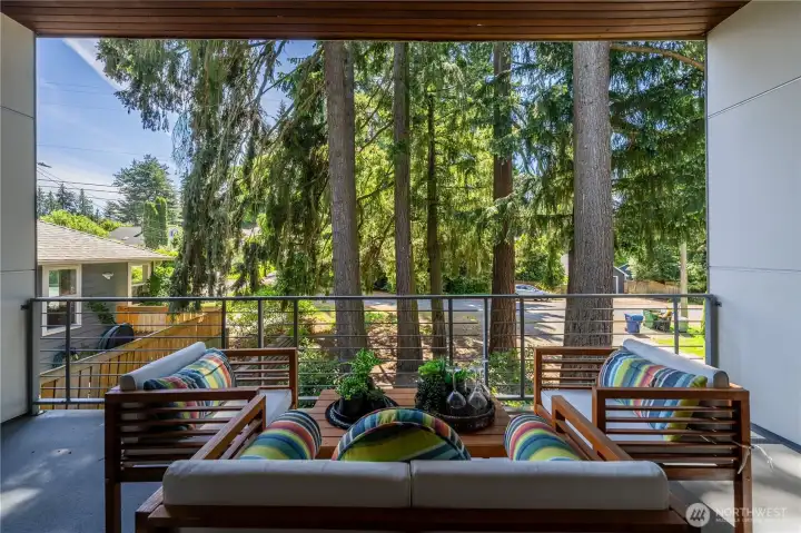 Enjoy a private, peaceful covered sitting area off of the primary suite.