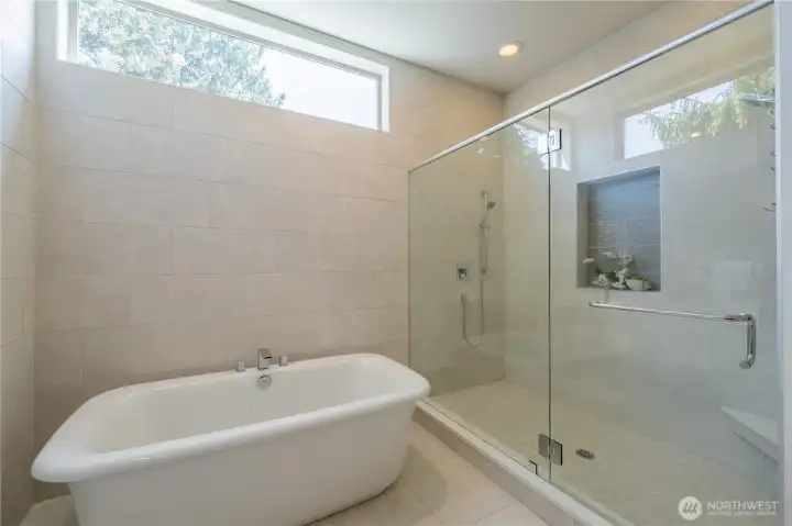 Large tub and walk-in shower.